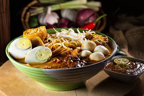  Laksa Johor: Un festín picante de sabores que te transportarán a la costa del Sur de Malasia!